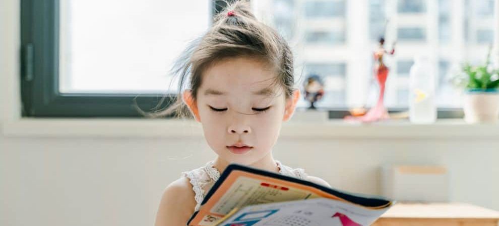 child reading Spanish Book